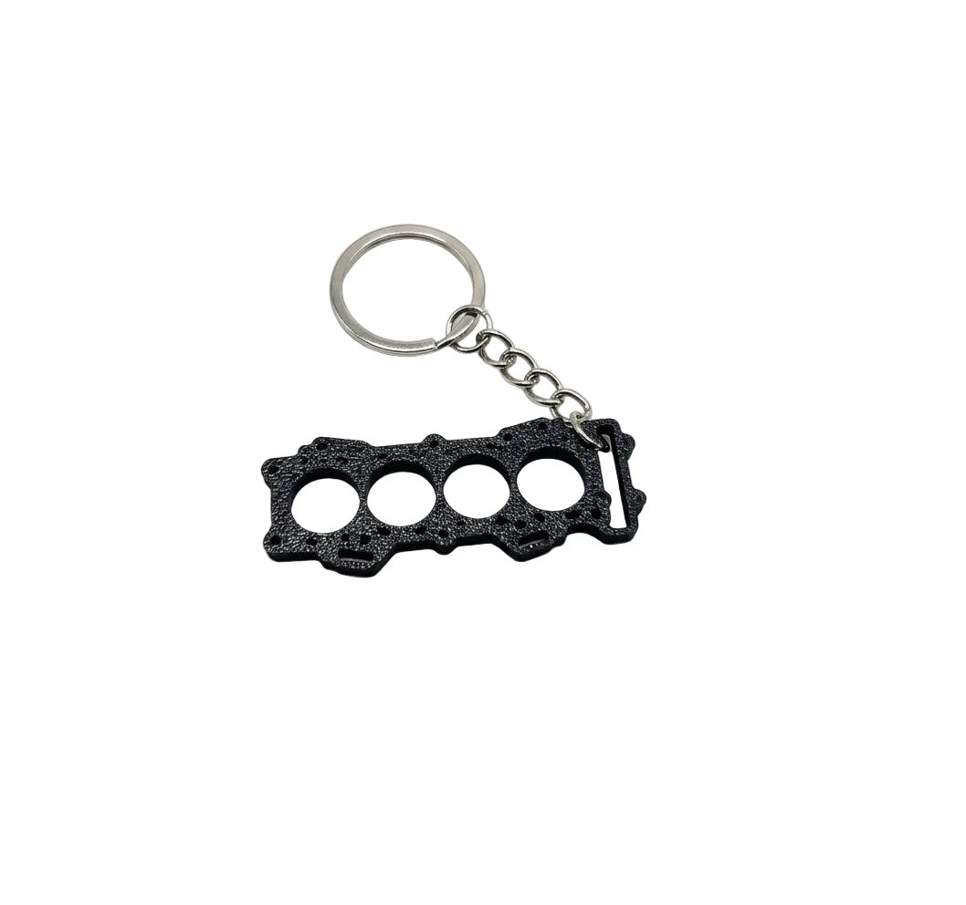 Porte-clé pour Kawasaki ZX6R, sur modèle de joint de culasse de Kawasaki ZX6R
Fabriqué en France
Impression 3D