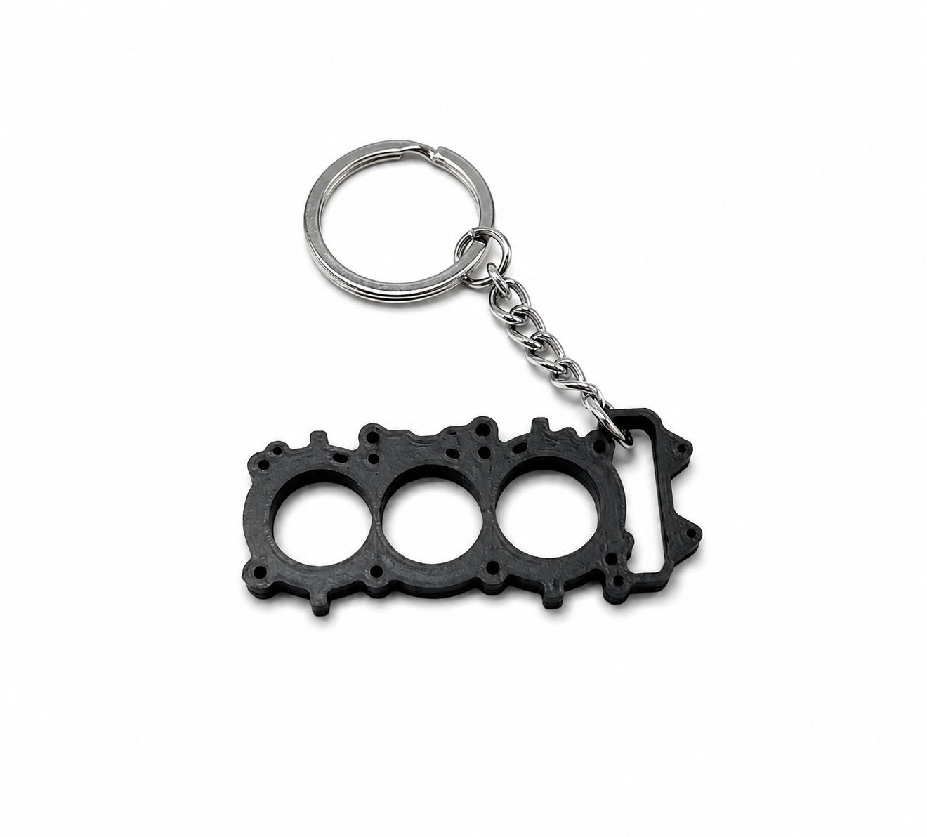 Porte-clé pour Triumph Street Triple, sur modèle de joint de culasse de  Triumph Street Triple
Fabriqué en France
Impression 3D