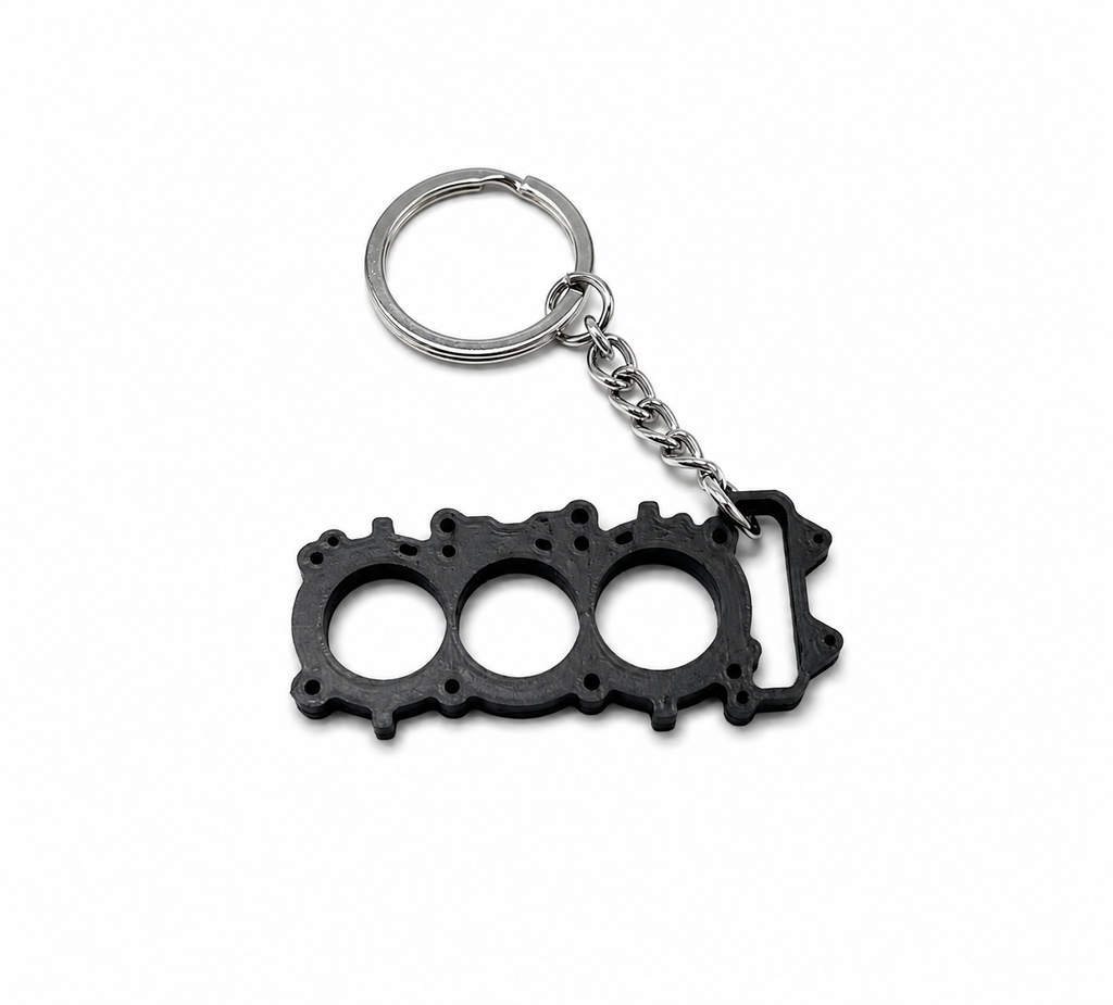 Porte-clé pour Triumph Street Triple, sur modèle de joint de culasse de  Triumph Street Triple
Fabriqué en France
Impression 3D